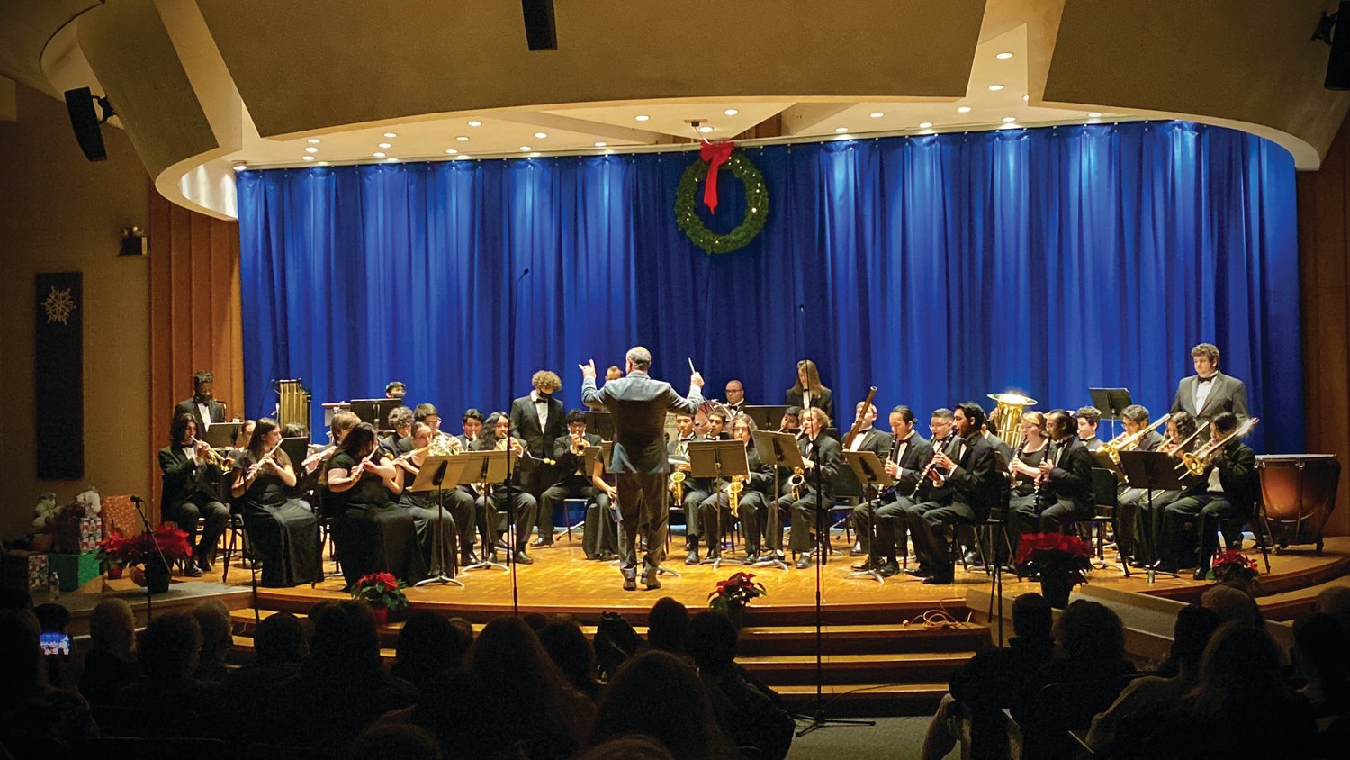 SUPER SPECIAL SOUNDS: JHS Music Department Ron Lamoureux leads the Panther band during the recently and highly-entertaining Christmas Concert.